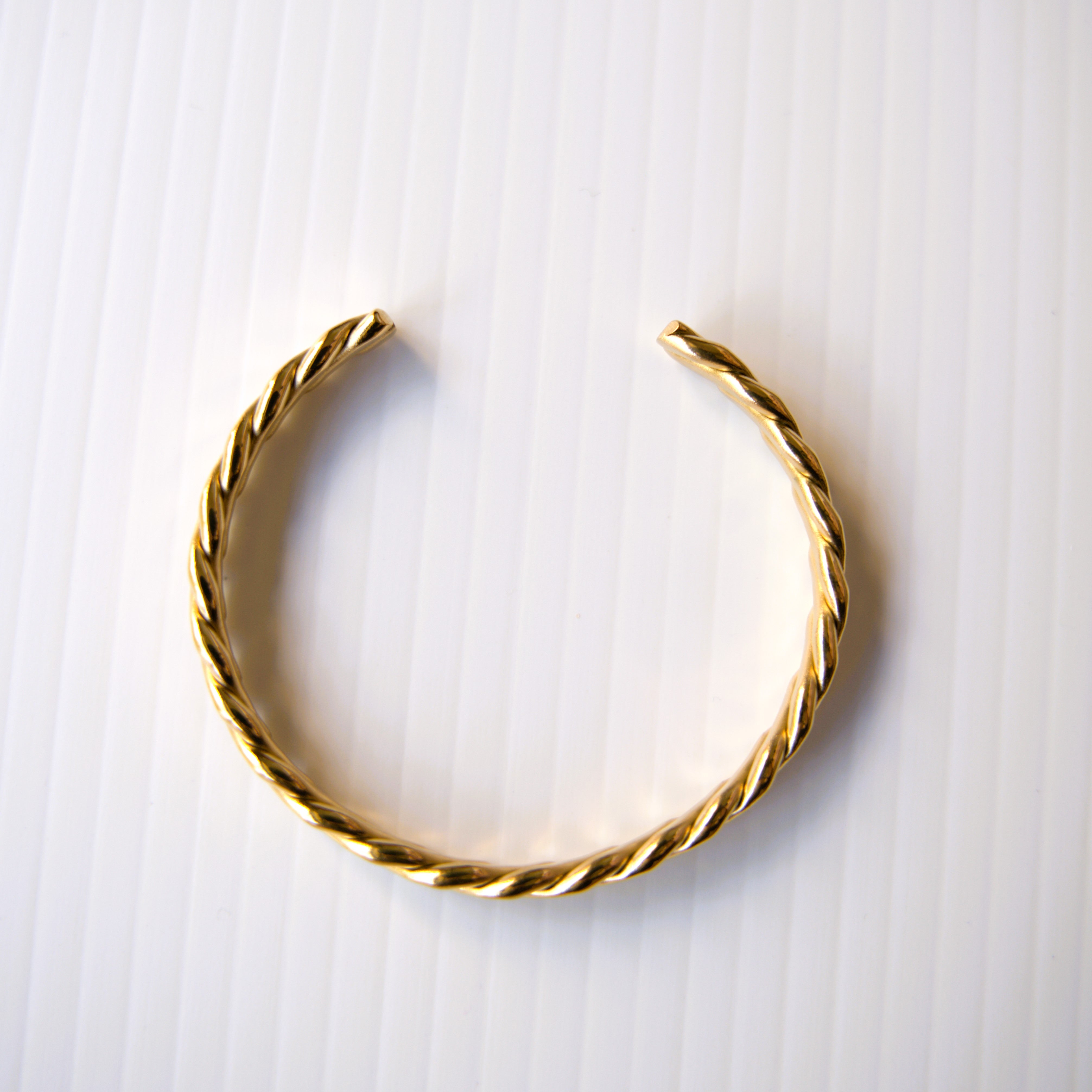 Radiant Twist Bangle