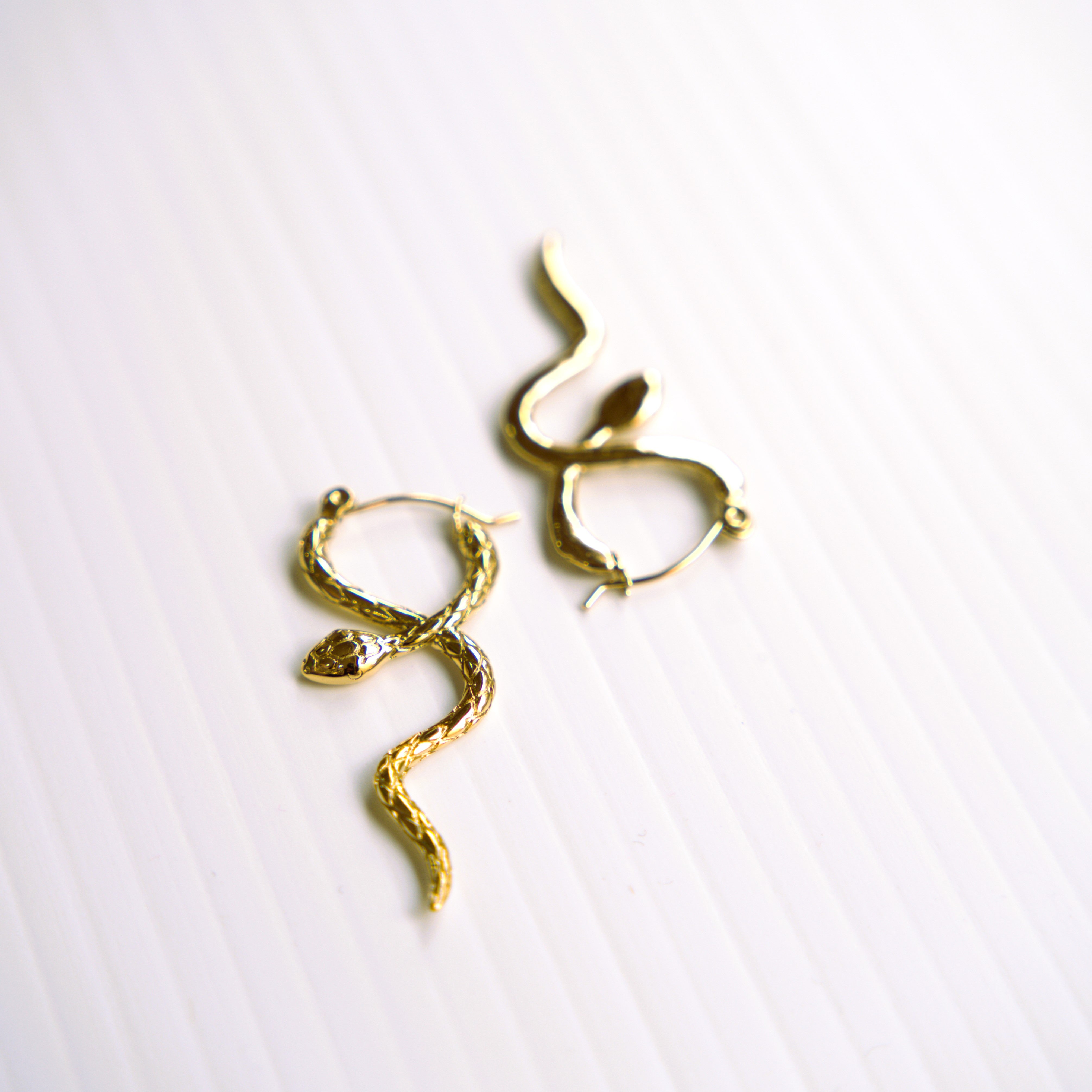 Serpent Twist Crossed Hoop Earrings