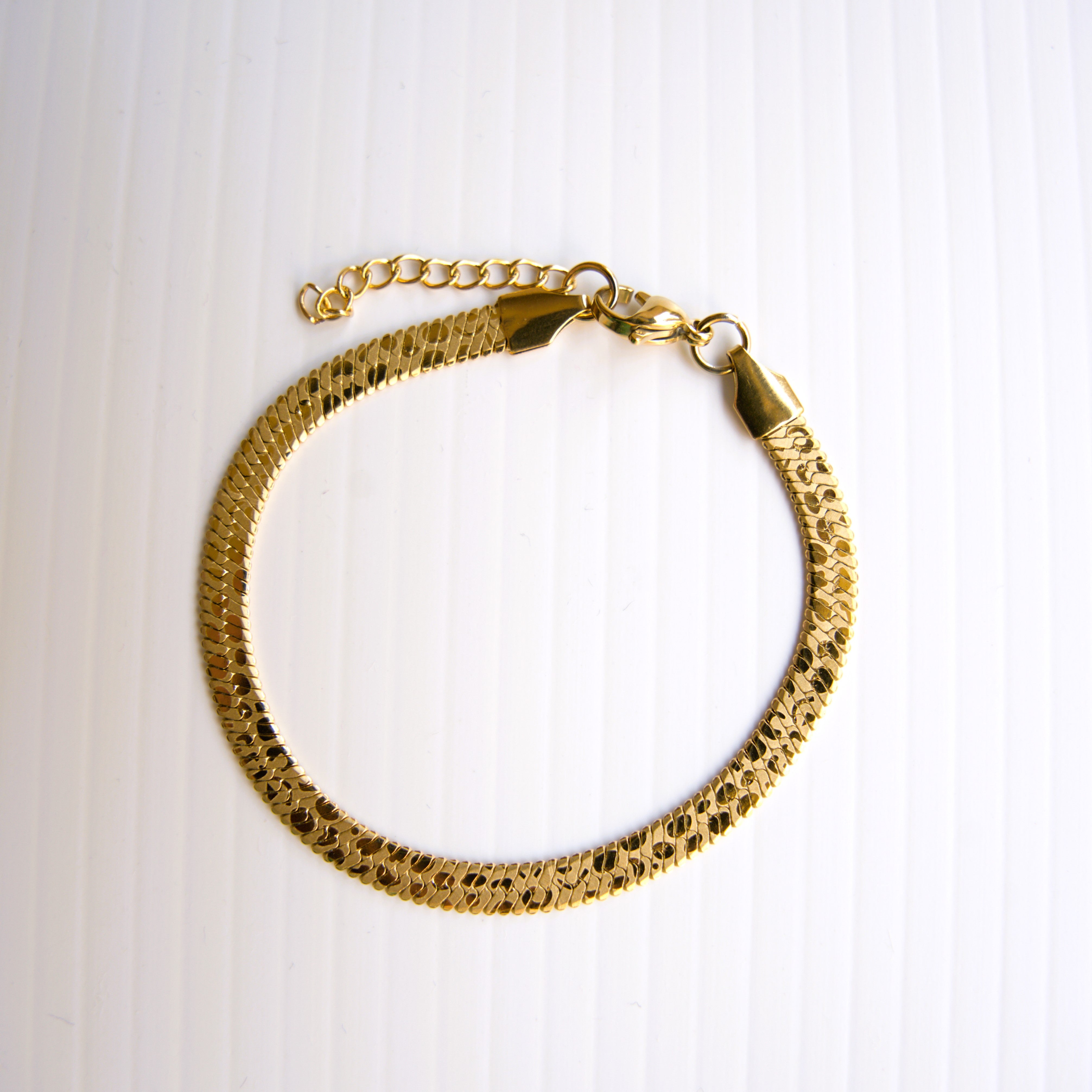 Golden Herringbone Elegance Bracelet